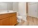 Bathroom featuring tile floors, wood vanity, and bright lighting at 13210 Essman Ave, Port Charlotte, FL 33953