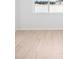 Bright bedroom with natural light and wood-look tile at 1799 Draughton Dr, Zephyrhills, FL 33541