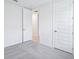Bedroom with neutral carpet, white trim and bright white walls at 1799 Draughton Dr, Zephyrhills, FL 33541