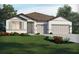 Inviting single-Gathering home with a well-manicured lawn and a two-car garage at 1799 Draughton Dr, Zephyrhills, FL 33541