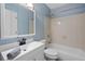 Cozy bathroom with a tub and shower combination, providing a comfortable and convenient space for daily routines at 2110 W Farwell Dr, Tampa, FL 33603