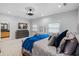 Large bedroom featuring a bed, furniture, and decor at 2110 W Farwell Dr, Tampa, FL 33603