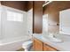 Bathroom featuring tub, shower, vanity, and toilet at 2707 Wood Pointe Dr, Holiday, FL 34691