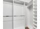 Spacious walk-in closet with ample shelving and hanging space at 32740 Tree Of Life Ave, Wesley Chapel, FL 33543