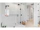 Bright and spacious bathroom featuring a glass-enclosed shower and stylish wood floors at 4754 Manning Ct, Sarasota, FL 34240