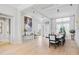 Open dining room featuring modern furnishings, elegant light fixtures, and natural light at 4754 Manning Ct, Sarasota, FL 34240