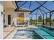 Inviting pool and spa area with stylish lounge seating, designed for relaxation and outdoor entertainment at 4754 Manning Ct, Sarasota, FL 34240