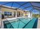 Stunning pool area with spacious deck, perfect for enjoying sunny days and outdoor gatherings at 4754 Manning Ct, Sarasota, FL 34240