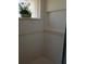 Tiled shower features a recessed shelf and decorative trim at 4875 Hansard Ave, North Port, FL 34286