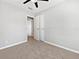 Spacious bedroom with carpet and ceiling fan at 5225 20Th N St, St Petersburg, FL 33714