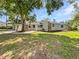 Charming one-story home with landscaped front yard and mature trees at 5225 20Th N St, St Petersburg, FL 33714