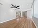 Living room boasts sleek vinyl plank flooring, ceiling fan, and ample natural light at 5225 20Th N St, St Petersburg, FL 33714