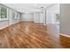 Open living room with wood floors, neutral paint, and natural light at 5225 20Th N St, St Petersburg, FL 33714