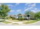 Corner lot home with a well-kept lawn, two-car garage, and charming curb appeal at 7308 Hermes Ct, Apollo Beach, FL 33572