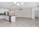 Bright and spacious living area that features sleek, tiled floors, abundant natural light and an open concept layout at 7308 Hermes Ct, Apollo Beach, FL 33572