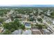 Aerial view highlighting a residential neighborhood with diverse single-Gathering homes, some featuring private pools at 14506 Sutter Pl, Tampa, FL 33625