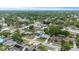 Wide aerial shot of a residential neighborhood with tree-lined streets and well-maintained homes at 14506 Sutter Pl, Tampa, FL 33625