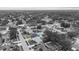 B&W aerial view of 14506 Sutter Pl Tampa, FL 33625 highlighting property lines and pool at 14506 Sutter Pl, Tampa, FL 33625