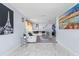 Bright living room with comfortable seating, modern decor, and large windows offering plenty of natural light at 14506 Sutter Pl, Tampa, FL 33625