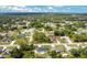 Community aerial shot showcasing the neighborhood and lush landscaping at 2706 Flagami Ln, North Port, FL 34286