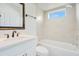 Clean bathroom with updated fixtures, a tiled shower/tub, and a calming ambiance for relaxation at 2706 Flagami Ln, North Port, FL 34286