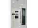 Modern kitchen featuring white cabinets, stainless steel appliances, tile floors and great natural lighting at 2706 Flagami Ln, North Port, FL 34286