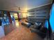 Spacious living room features stylish furnishings and access to the backyard at 663 68Th S Ave, St Petersburg, FL 33705