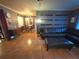 Open living and dining area with tiled floors and modern decor at 663 68Th S Ave, St Petersburg, FL 33705