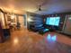 Open floor plan of the living room featuring tile flooring and backyard access at 663 68Th S Ave, St Petersburg, FL 33705
