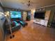 Inviting living room featuring tile flooring, neutral walls, and ample natural light at 663 68Th S Ave, St Petersburg, FL 33705