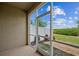 Screened patio offering serene views and natural light, ideal for relaxation and outdoor enjoyment at 8126 Muddy Pines Pl, Tampa, FL 33635