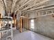 Exposed framing and block walls offer a glimpse into the construction of a new home or renovation project at 7342 Skyview Ave, New Port Richey, FL 34653
