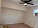 Bedroom with light-colored walls, a ceiling fan and an air conditioning unit at 1834 28Th N Ave, St Petersburg, FL 33713