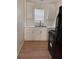 Compact kitchen with stainless steel sink, modern countertops, and a range at 1834 28Th N Ave, St Petersburg, FL 33713
