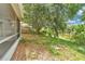 Backyard bordering a tranquil pond is the perfect place to relax and enjoy the outdoors at 22802 Roderick Dr, Land O Lakes, FL 34639