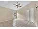 This bright bedroom features a ceiling fan and great natural light at 22802 Roderick Dr, Land O Lakes, FL 34639