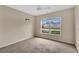 This clean bedroom offers natural light and comfortable carpet at 22802 Roderick Dr, Land O Lakes, FL 34639