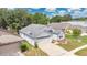 Well maintained home featuring mature trees, an attached two car garage, and neutral color palette at 22802 Roderick Dr, Land O Lakes, FL 34639