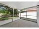 Enjoy the outdoors bug-free on this screened patio at 22802 Roderick Dr, Land O Lakes, FL 34639