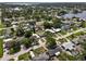 Aerial shot of homes near a waterfront neighborhood with mature trees and landscaping at 9033 3Rd N St, St Petersburg, FL 33702