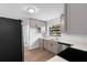 Kitchen featuring stainless appliances, undermount sink and grey cabinets at 9033 3Rd N St, St Petersburg, FL 33702