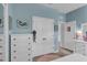 Cheerful bedroom featuring a light blue wall, accented with a mermaid theme at 10815 Laxer Cay Loop, San Antonio, FL 33576