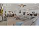 Spacious open-concept living area connects seamlessly to the dining room and kitchen at 10815 Laxer Cay Loop, San Antonio, FL 33576