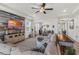 Inviting living space flows seamlessly to the dining area, perfect for entertaining guests at 10815 Laxer Cay Loop, San Antonio, FL 33576