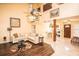 Spacious living room with a ceiling fan, hardwood flooring, and a comfortable white couch at 3009 Ridgevale Cir, Valrico, FL 33596