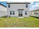 This spacious backyard is perfect for outdoor enjoyment, featuring a well-maintained lawn and ample room at 3550 Moscato Dr, Brooksville, FL 34602