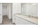 Bathroom with double vanity, granite countertops, and tile floors create an elegant and functional space at 3550 Moscato Dr, Brooksville, FL 34602