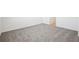 Bright bedroom featuring neutral carpet, white walls, and trim, offering a clean and modern aesthetic at 3550 Moscato Dr, Brooksville, FL 34602