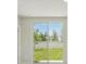 Sliding glass doors open to a well-maintained backyard, creating a bright and airy living space at 3921 Radiant Mountain Dr, Plant City, FL 33565