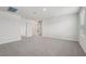 Spacious bedroom with ample natural light and neutral carpet flooring at 3921 Radiant Mountain Dr, Plant City, FL 33565